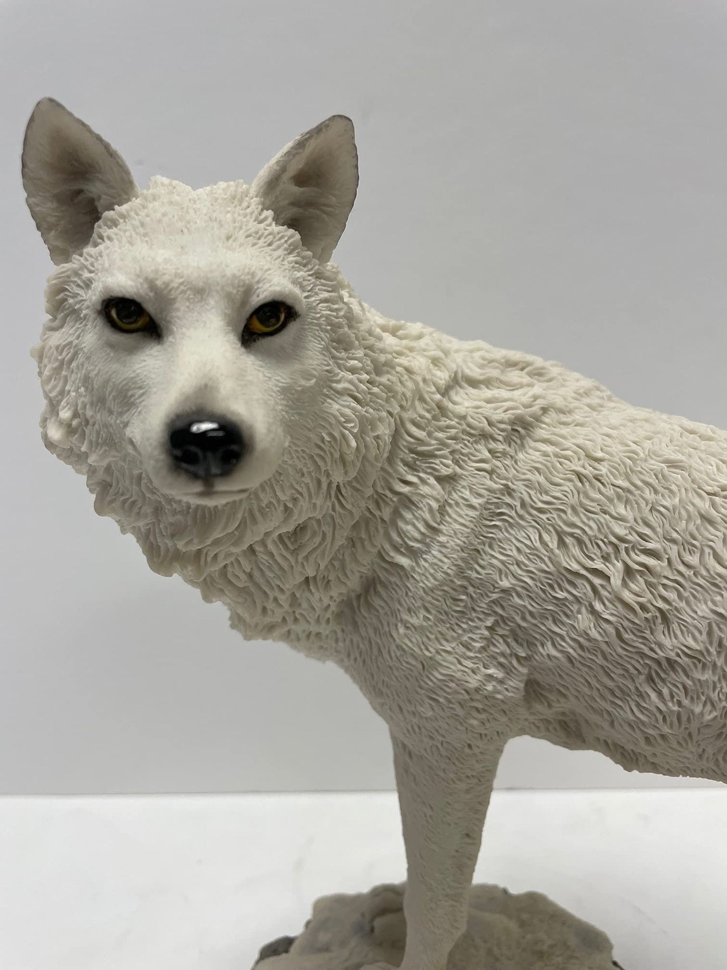 9.5 Inch Wolf on Snowy Ground Looking Back Statue Figurine, White