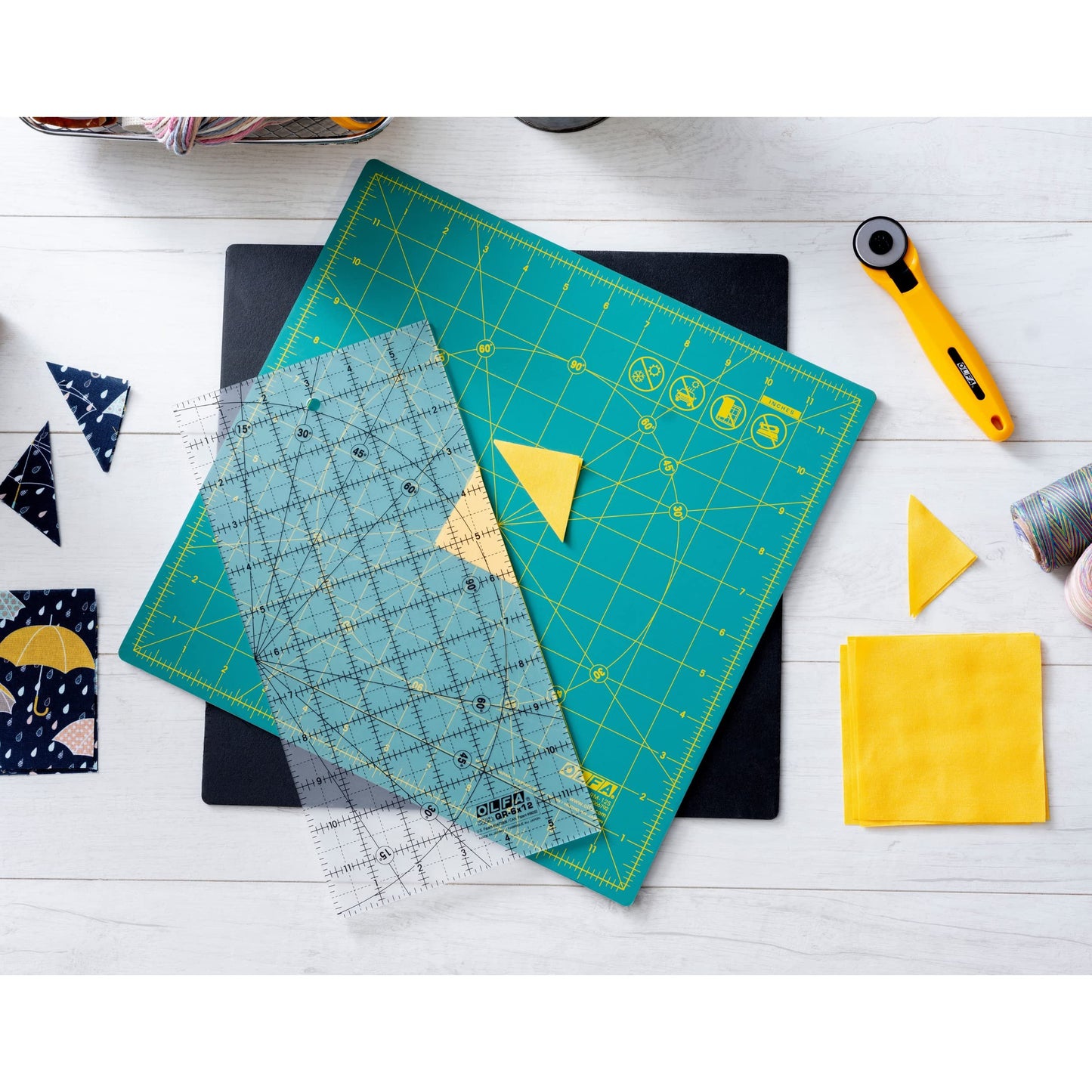 OLFA Rotating Cutting Mat - Self Healing Square Rotary Mat with Grid for Fabric, Sewing, Quilting, & Crafts, Rotates 360 Degrees, Use with Rotary Cutters