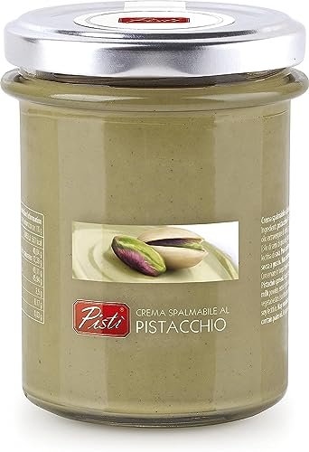 Jar of Pisti pistachio spread with a lid on a white background