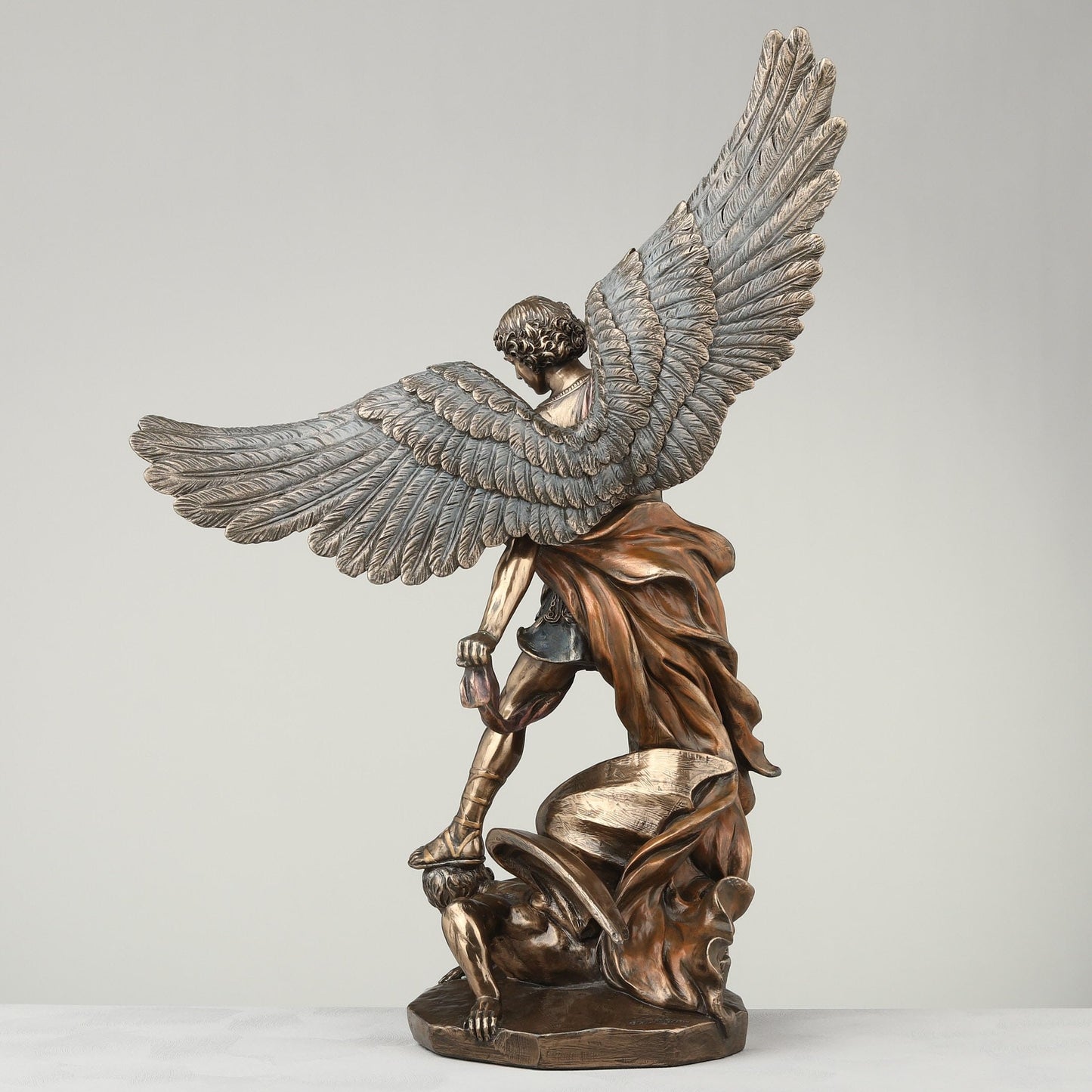 Veronese Design 14 1/8 Inch Archangel Saint Michael Tramples Demon Religious Sculpture Defeating Lucifer Resin Statue Bronze Finish