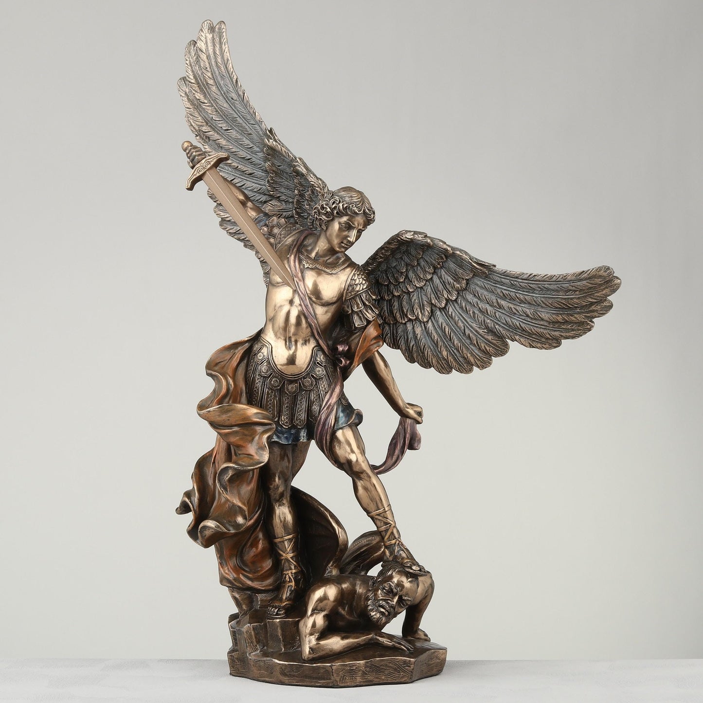 Veronese Design 14 1/8 Inch Archangel Saint Michael Tramples Demon Religious Sculpture Defeating Lucifer Resin Statue Bronze Finish