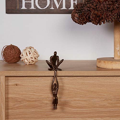 Danya B. ZD16169 Contemporary Metal Shelf Décor - Bronze Sculpture - Man Lifting Woman from Ledge