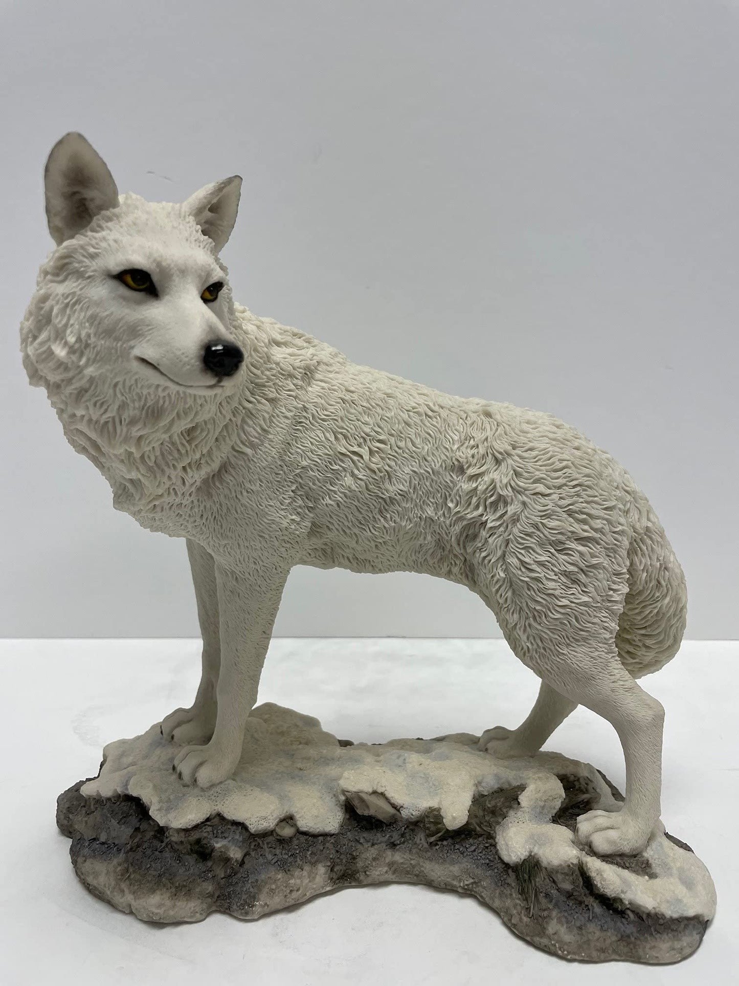 9.5 Inch Wolf on Snowy Ground Looking Back Statue Figurine, White