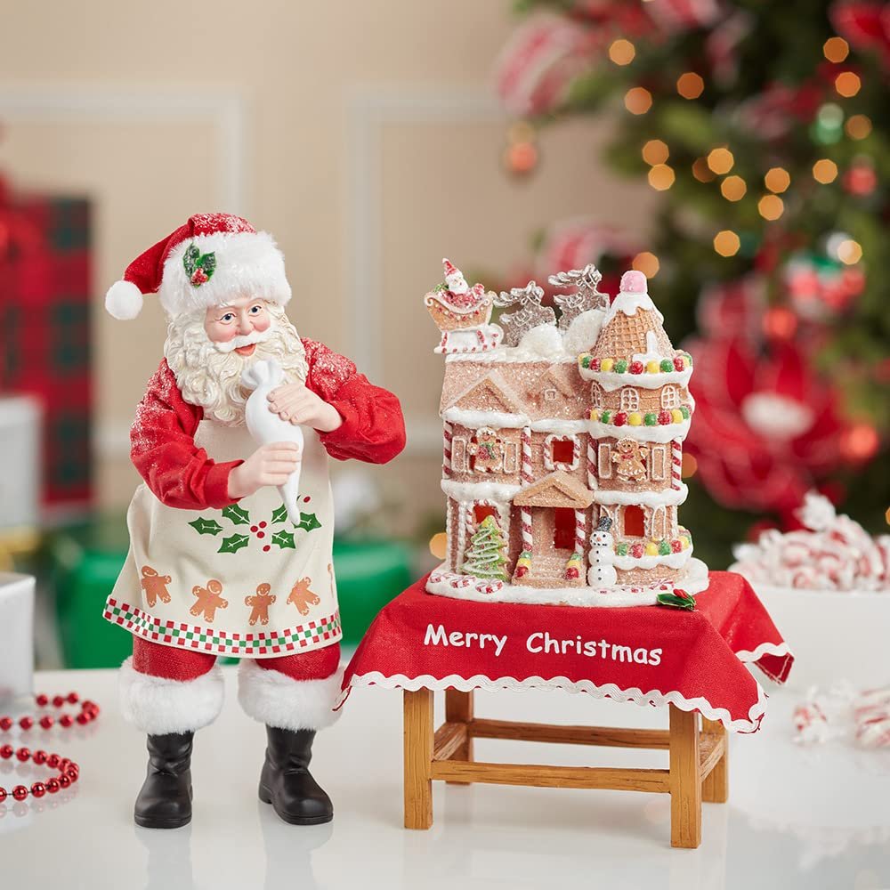Kurt Adler 10.5-Inch Battery-Operated Fabriche Santa Decorating LED Gingerbread House Table Piece (JEL1203)