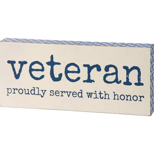 Rustic wooden block sign displaying "Veteran Proudly Served With Honor" sentiment in patriotic blue color. Sides feature debossed white star designs on blue for added texture.