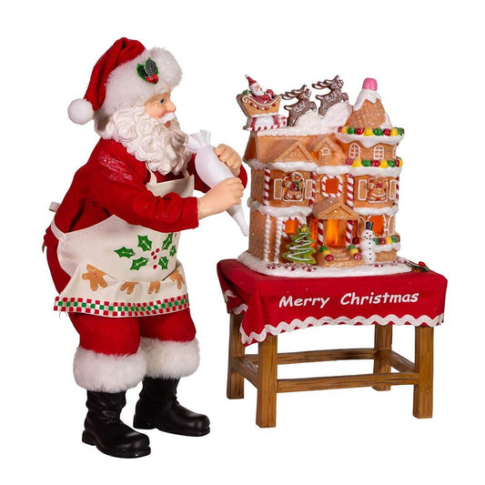 Kurt Adler 10.5-Inch Battery-Operated Fabriche Santa Decorating LED Gingerbread House Table Piece (JEL1203)
