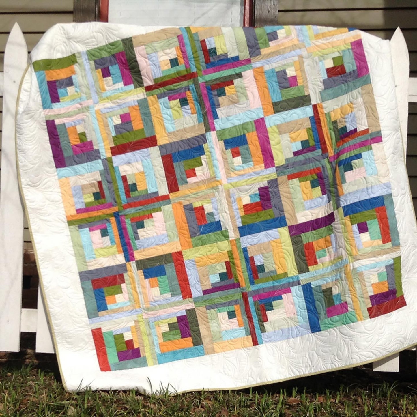 Bundle of Curvy Log Cabin Trim Tool 8in Finished Blocks and Cut Loose Press Carousel Curvy Log Cabin Quilt Pattern
