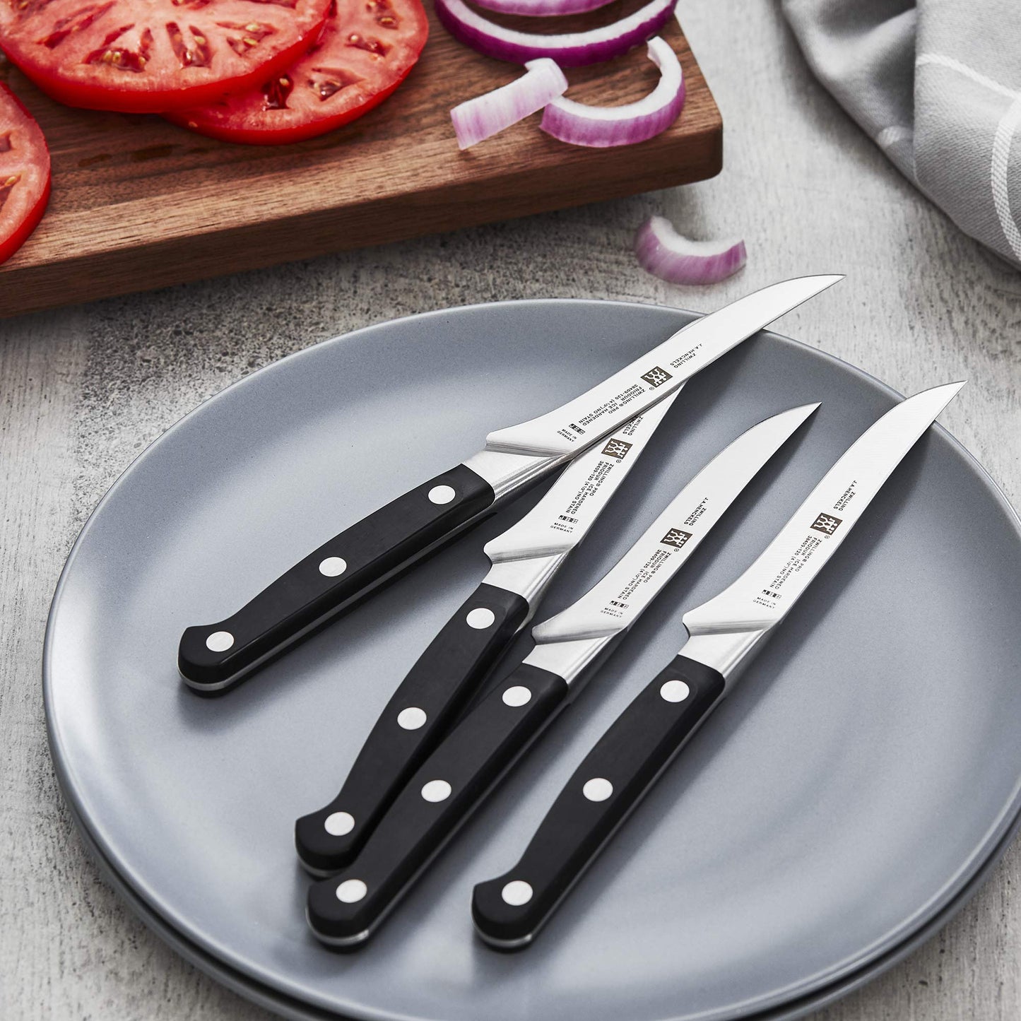 Zwilling J.A. Henckels Pro 4-pc Steak Knife Set, Black/Stainless Steel, 4.5" (38430-002)