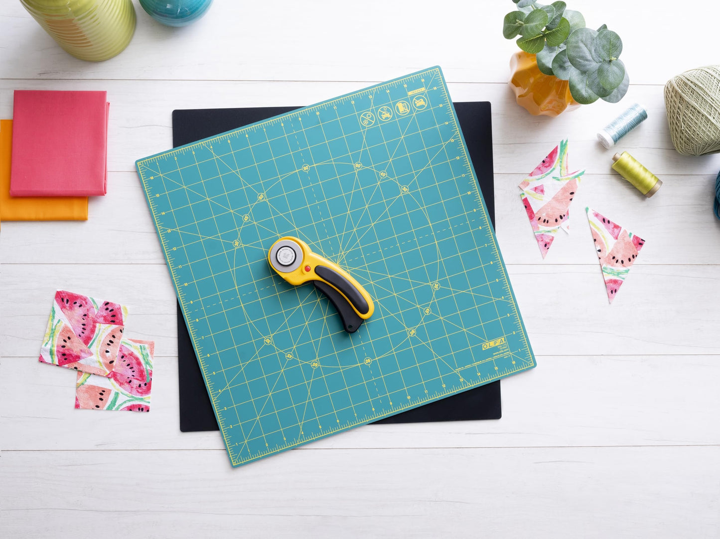 17"x17" (New) OLFA Rotating Cutting Mat - Self Healing Square Rotary Mat with Grid for Fabric, Sewing, Quilting, & Crafts, Rotates 360 Degrees, Use with Rotary Cutters