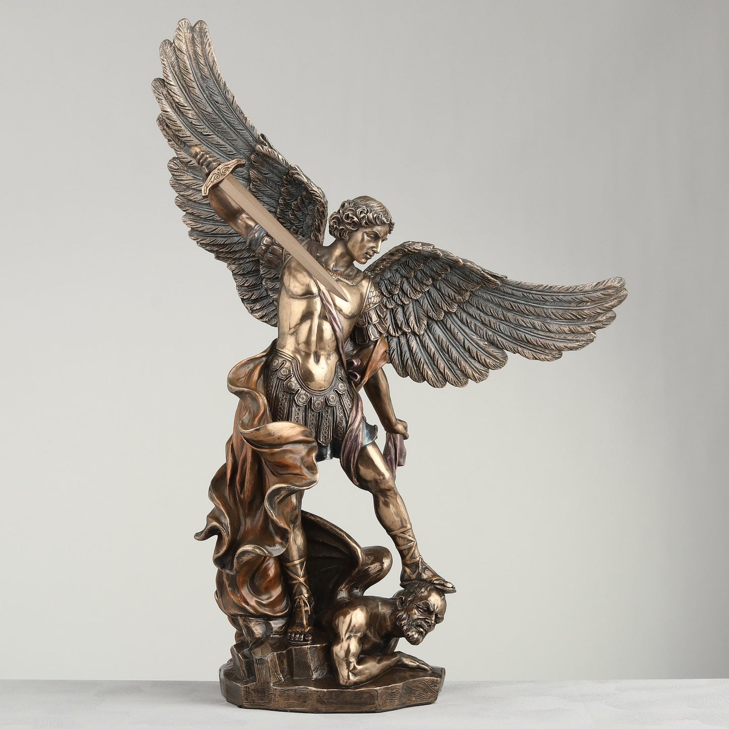 Veronese Design 14 1/8 Inch Archangel Saint Michael Tramples Demon Religious Sculpture Defeating Lucifer Resin Statue Bronze Finish